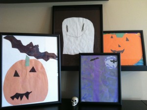 The few I kept from my son and daughter when they were in pre-school. Frame them to display each year.